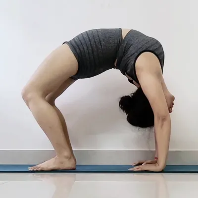 Chakrasana, or Wheel Pose, is an advanced backbend that dramatically increases spinal flexibility and strengthens the entire back. We build up to this pose safely and step by step.