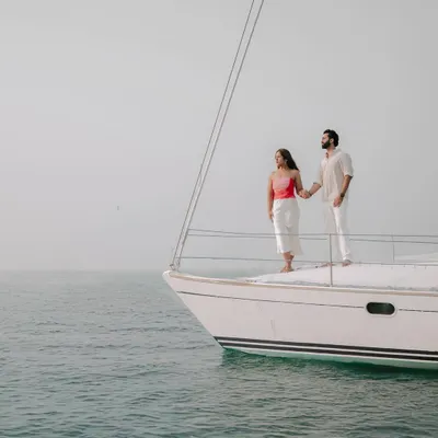 Anushka and Himanshu enjoying the open sea on a private yacht off the coast of Mumbai. A yacht shoot is a fantastic way to get unique and luxurious pre-wedding photos.