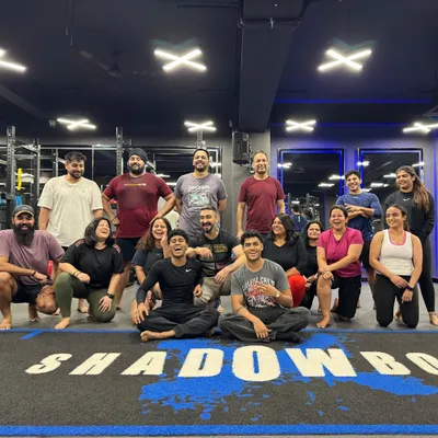 The aftermath of an epic 'Bass and Burn' DJ workout. This is our fam, energized and smiling after sweating it out together to some killer beats. It’s this sense of community that makes our fitness parties so special.