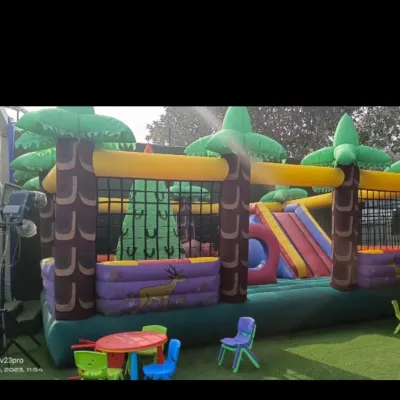 This jungle adventure bouncy castle is one of my most popular rentals. It features a slide and a large jumping area, perfect for kids who love to explore and play.