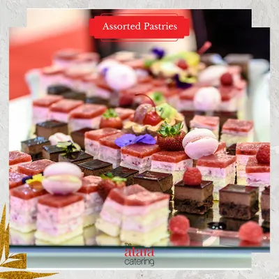 A colourful and tempting platter of assorted European pastries. Our dessert selection includes mini cheesecakes, chocolate mousse bites, and fruit tarts, perfect for any celebration.