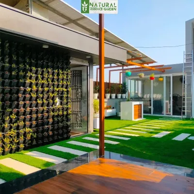 A large vertical garden installed at our Sonipat project, creating a massive green wall that acts as a stunning, living backdrop.