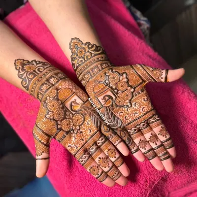 A trial session is the perfect way to finalize your bridal design. This piece shows a detailed palanquin (doli) motif, allowing the client to see our artistry upfront.