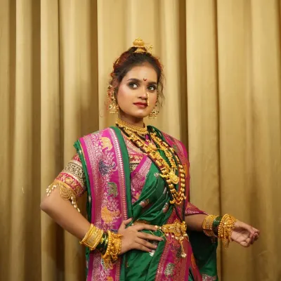 This is another angle of the traditional Peshwai bridal look, highlighting the side profile and the way the jewelry and hairstyle come together. I focus on teaching the 360-degree perfection required for bridal clients.