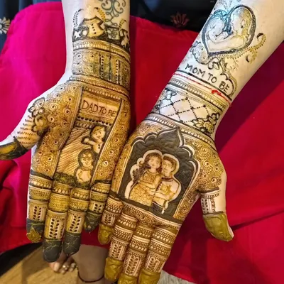 A highly personalized baby shower mehendi. I incorporated a portrait of the couple, the words 'Mom to be' and 'Dad to be', and even drawings of their other children to celebrate the growing family.