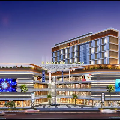 A landmark mixed-use project designed to stand out. This building combines a multi-level commercial podium with a hotel tower, featuring large digital screens and rooftop amenities to create a vibrant urban hub.