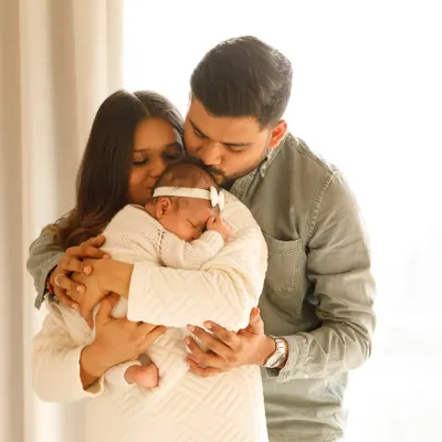 A brand new family of three, wrapped in a warm embrace. I love capturing the overwhelming love and emotion in the first few days after bringing a baby home.