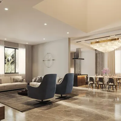 An open-concept living and dining area designed for seamless flow and connection. I used a neutral color palette with statement furniture pieces and a grand chandelier to define the dining space within the larger room.