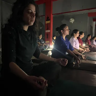 In the quiet of the studio, we turn inward. Meditation is a practice of observing the mind and finding stillness, a key tool for managing stress.