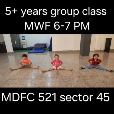 Our 5+ years group class in action. These students are mastering their straddle splits, a key flexibility skill. We hold these classes at our Sector 45 studio every Monday, Wednesday, and Friday from 6-7 PM.