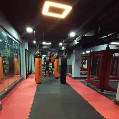 A view of our striking area, lined with high-quality heavy bags. This is where our fighters build power and perfect their boxing and kickboxing combinations.