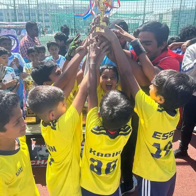 The moment of victory! Our Under-8 team lifts the Blues Super Cup trophy. This is a testament to their hard work, discipline, and the guidance of our coaches.