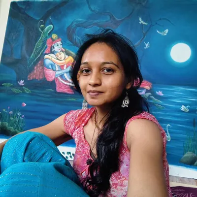 Me with my Radha Krishna moonlight painting. These moments after finishing a piece are so special... a quiet connection with the art before it goes to its new home. Happy Kojagiri Poornima. 😇