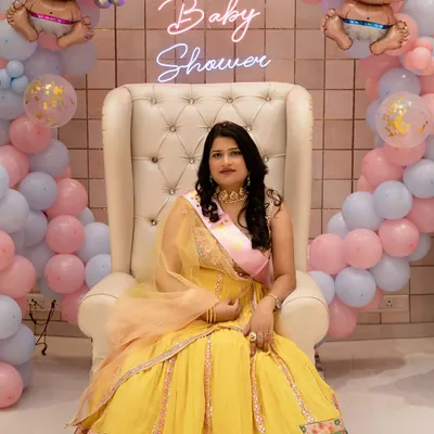 The guest of honor at her beautiful baby shower. Seated on a throne fit for a queen, this mother to be is glowing with happiness. I capture these key portraits as well as the candid moments of the day.