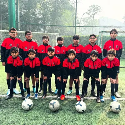 Elite performance needs elite style. Our U-13 warriors ready to conquer the pitch in their winter kit.