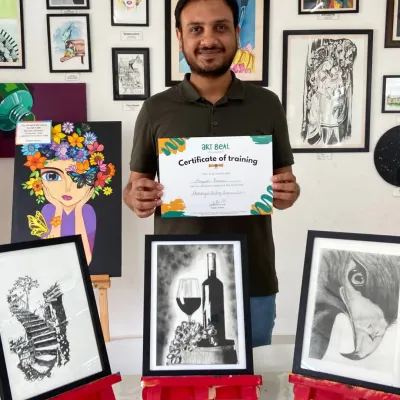 Here is one of our recent graduates from the Sketching Short Term Course, proudly displaying his final artworks. In just 8 weeks, he mastered graphite techniques to create these three incredible, framed pieces.