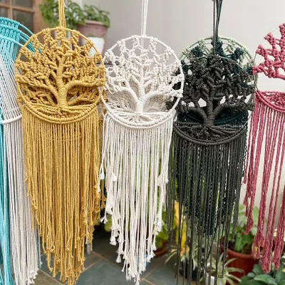 This is my collection of Kalpavriksha, or Tree of Life, wall hangings. Each one is handmade with so much care, and they are a huge hit for housewarming gifts. I can make them in many different colors to match any home.