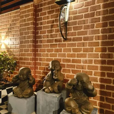 We love seeing how you style our pieces. A client created this wonderful display in their foyer with our 'lucu' monks representing "see no evil, speak no evil, hear no evil."