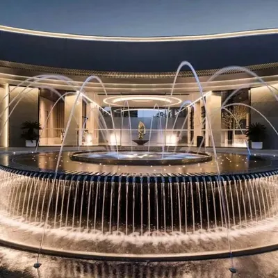 This grand, circular fountain at a commercial property in Chandigarh is a work of art. The combination of cascading water and arcing jets, all illuminated from below, creates a spectacular and dynamic centerpiece.
