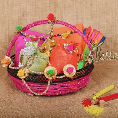 A vibrant Holi festival gift basket, styled with colors and festive elements to create an attractive image for seasonal marketing.