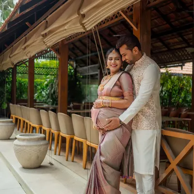 A beautiful portrait of an expecting couple, framed by the warm, natural architecture. This maternity session was all about capturing their shared excitement and love.