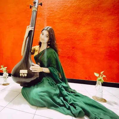 With my tanpura, the instrument that connects me to the soul of Indian classical music. This is where my musical journey began.