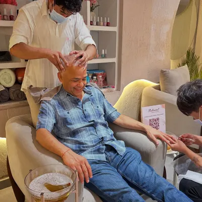 Self care is for everyone. This client is getting the ultimate treatment with a head massage, manicure, and pedicure all at once. We love making our male clients feel comfortable and pampered.