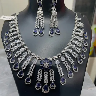Rent this sophisticated sapphire-blue and crystal necklace set for your wedding reception or any cocktail event. Its elegant design adds a luxurious feel to your outfit without the commitment of buying, perfect for pairing with a modern gown or an Indo-western ensemble.