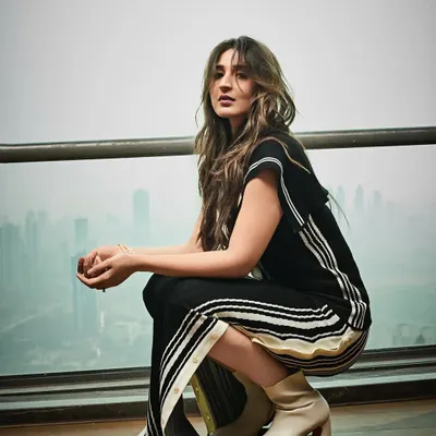 A modern and chic look for Dhvani against the Mumbai skyline. This striped co-ord set is effortlessly cool and perfect for a city vibe.