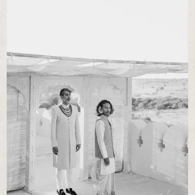Featured in Vogue, Kahran and Gourav's wedding was a testament to their love story. This portrait, taken in the starkly beautiful landscape of Jaisalmer, captures their quiet strength and elegance. We were so proud to help bring their vision to life.