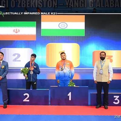 The Indian flag flying high at the 21st Asian Para Karate Championship in Uzbekistan. Our para-athlete Tarun Sharma stands at the number one position on the podium after winning the Gold Medal, a historic moment for Indian para-karate.