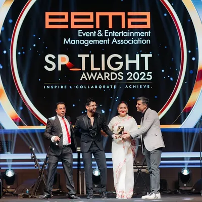 On stage receiving an award at the EEMA Spotlight Awards. Being recognized by the Event and Entertainment Management Association is a huge honor.