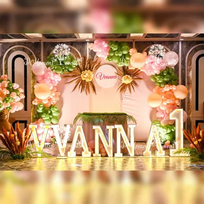 A beautiful boho-inspired teddy bear theme for Vianna's first birthday. The stage features a soft color palette, dried palm leaves, pampas grass, and marquee letters, creating a chic and gentle atmosphere.
