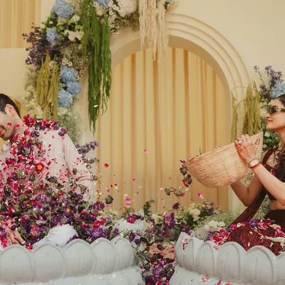 A playful moment during the 'phoolon ki haldi'. Watching the couple laugh and shower each other with petals was a reminder that love does not always need words.