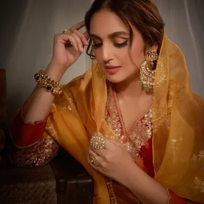 A moment of quiet elegance with Huma Qureshi. She is styled in a rich, embroidered velvet kurta set by Heena Kochhar, complemented by exquisite jewels from Golecha Jewels.