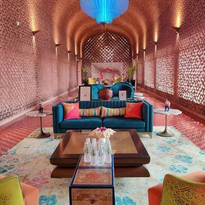 The lobby of the Taj Devi Ratn Resort & Spa, where I designed the interiors to be a sanctuary in the Pink City. The intricate latticework walls and vibrant custom furnishings create a space where peace is not just felt, it is designed.