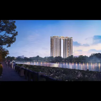 An evening view of our twin towers in Koregaon Park, Pune, overlooking the river. The design features a connecting sky bridge, creating a harmonious and iconic addition to the urban skyline.