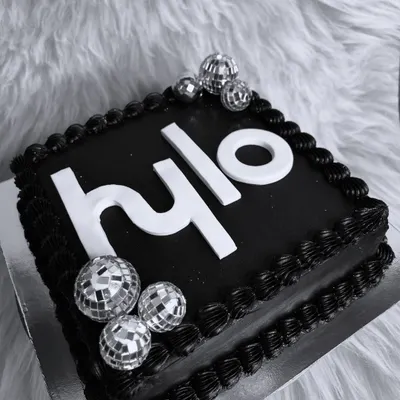 A sleek, black-and-white logo cake for the launch of Hylo Mumbai. We love creating custom cakes that match a brand's aesthetic for their most important events.