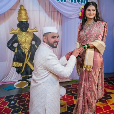 A beautiful moment from a ring ceremony, with the groom-to-be kneeling to present the ring. We capture these traditional and heartfelt gestures with reverence and care.