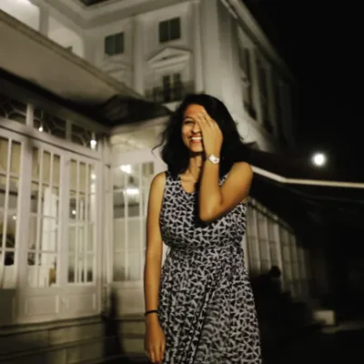There's something I love about blurry candids. This shot captures a genuine, unposed moment of laughter during a night out.