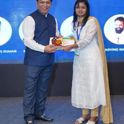 Receiving an award at the GLAON 2023 conference. This recognition is not just for me, but for the trust my clients place in me to guide them through graphology and signature correction.