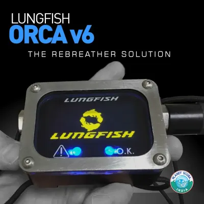A close-up of the Lungfish ORCA v6 rebreather's cutting-edge electronics. The robust, solid-state CO2 monitor and protected wiring are designed for failsafe mechanics and rugged practicality, providing critical safety information through highly visible displays.