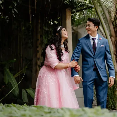 A happy couple shares a look of love amidst the greenery of our venue. Our natural setting provides countless beautiful spots for romantic portraits.