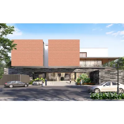 A daytime visualization of a luxury clubhouse for a 7.1-acre residential community in Bengaluru. The facade combines bold, solid brick volumes with a transparent, welcoming ground floor, clearly defining the public and private zones within the building.