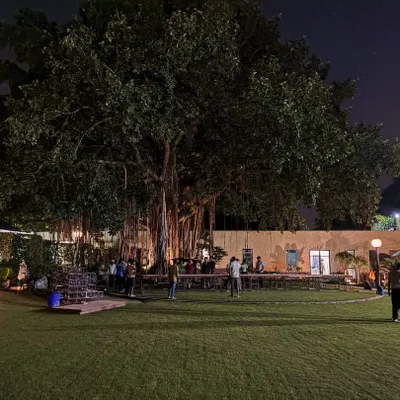 The calm before the storm. This is the Jazz Weekender venue at 1AQ in New Delhi, hours before the gates open. Setting up under the iconic banyan tree, we transform this lawn into a hub for live music and community.
