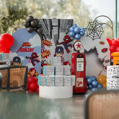 This is how I bring a superhero universe to life. Every detail in this setup, from the comic book-style backdrops to the character cutouts and themed props, is meticulously planned to create an immersive and action-packed birthday experience.