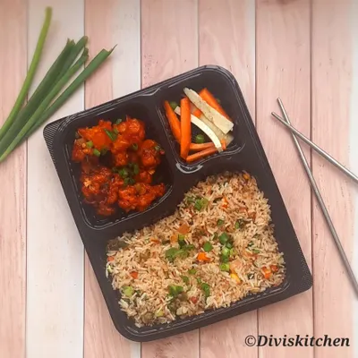 Sometimes you just crave something different, which is why I love adding Indo-Chinese meals to my daily menu. This combo includes my popular Gobi Manchurian, vegetable fried rice, and some crisp pickled veggies, packed and ready for your office lunch.