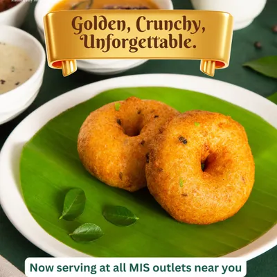 Our Uddin Vada is a classic for a reason. We fry it until it's perfectly golden and crunchy on the outside, while staying soft and fluffy inside. Served on a banana leaf, it's a true taste of tradition.
