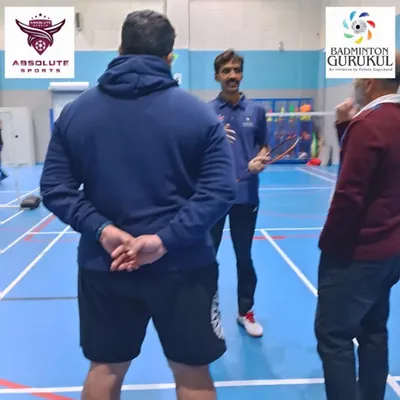 A senior coach from the Pullela Gopichand Academy providing expert guidance at our special coaching camp at Absolute Sports in Doha, Qatar.