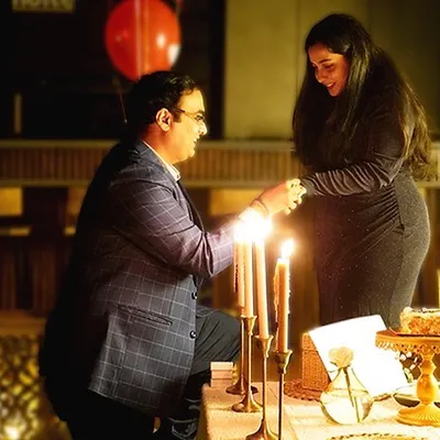 The magical moment of a proposal, illuminated by candlelight. I focus on creating an intimate and romantic ambiance that makes the moment feel truly special.